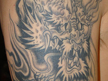 Dragon+tattoo+arm+chest